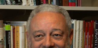 Haiti Since 1804: Critical Perspectives on Class, Power, and Gender Alt text: Split image featuring the cover of the book "Haiti Since 1804: Critical Perspectives on Class, Power, and Gender" by Alex Dupuy on the left, with a distressed Haitian flag as background; and on the right, a grayscale portrait of a smiling man with a beard seated in front of a bookshelf filled with academic books.